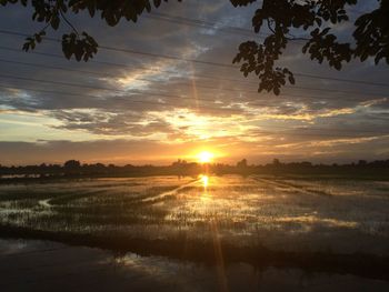 Scenic view of sea against dramatic sky