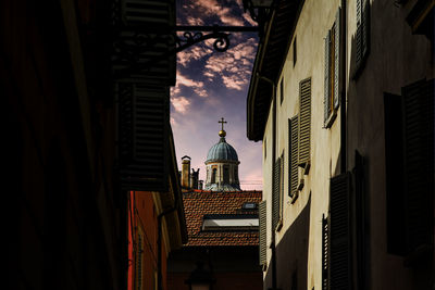 Low angle view of buildings against sky in city