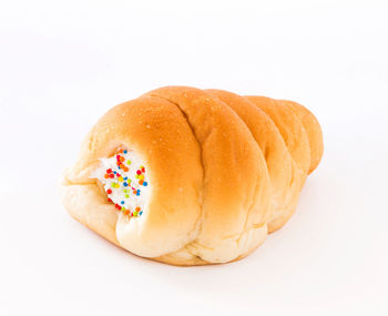 Close-up of bread against white background