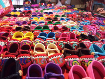 Full frame shot of colorful shoes for sale in market