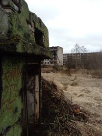 Abandoned house against sky