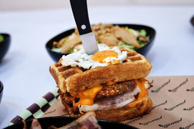 Close-up of burger on table