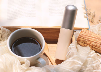 High angle view of coffee cup on table