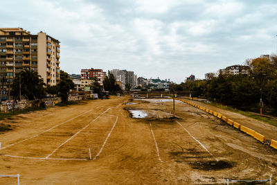 High angle view of city street against sky