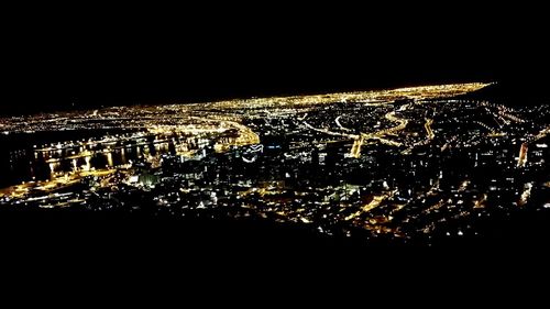 Illuminated cityscape at night