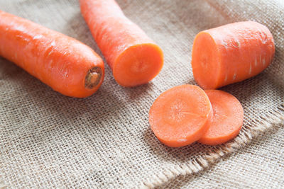 Close-up of carrots on burlap