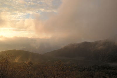 Scenic view of mountains against sky during sunset