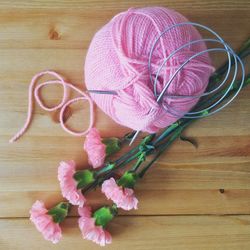 High angle view of pink flower on table