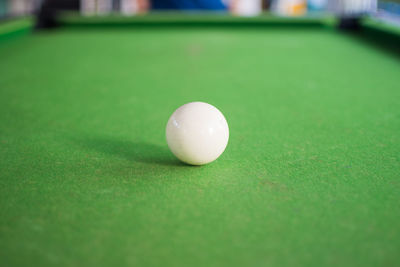 Close-up of ball on pool table