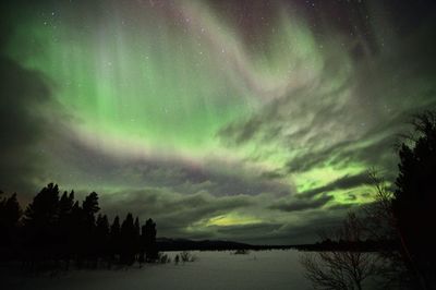 Landscape against sky at night