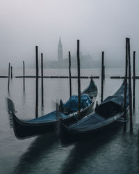 Gondolas at mooring in the mist