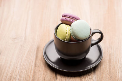 High angle view of coffee cup on table