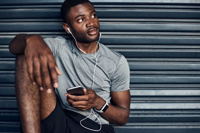 Young man using mobile phone