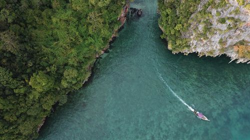 High angle view of sea by cliff