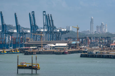 Entrance to the panama canal and container loading area in the port of balboa