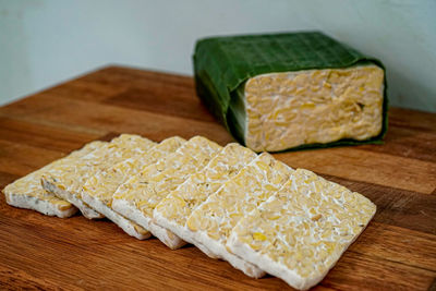 Close-up of bread on cutting board