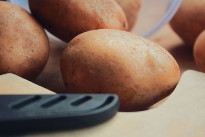 Close-up of potatoes on table