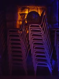 Chairs in illuminated room