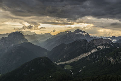 Scenic view of mountains against sky during sunset