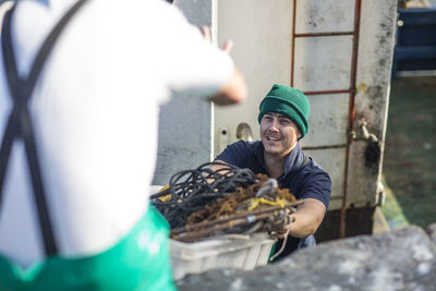 Fishermen working on trawler