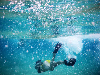 Woman swimming in sea