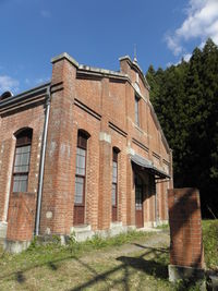 Low angle view of old building against sky