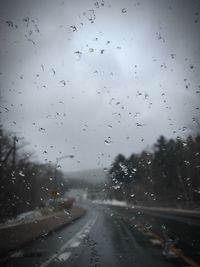View of rain drops on road