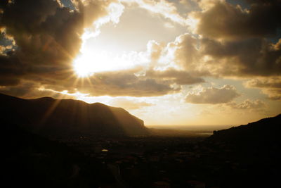 Scenic view of mountains against sky during sunset