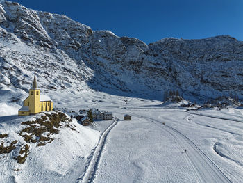 Scenic view of snowcapped mountains against sky