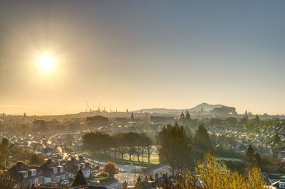 High angle view of city at sunset