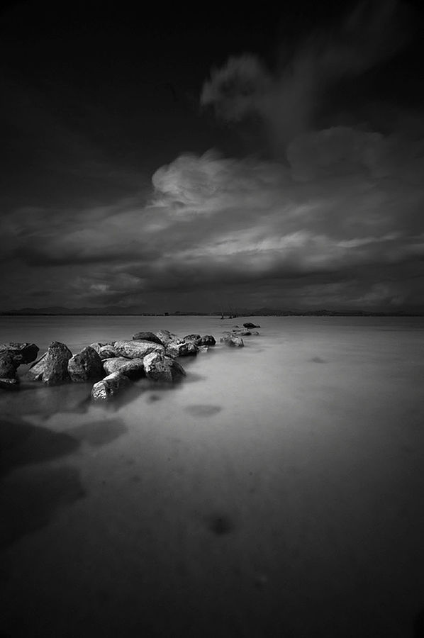 water, sea, sky, beach, tranquil scene, tranquility, scenics, beauty in nature, shore, cloud - sky, horizon over water, nature, cloudy, idyllic, cloud, sand, dusk, calm, rock - object, outdoors