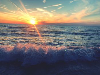 Scenic view of sea against sky during sunset