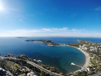 High angle view of sea against blue sky