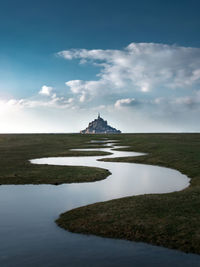 View of castle against cloudy sky