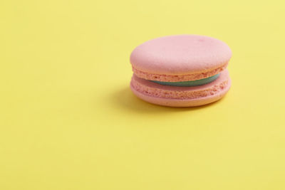 Close-up of ice cream against yellow background