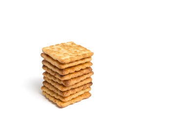 Stack of cookies against white background