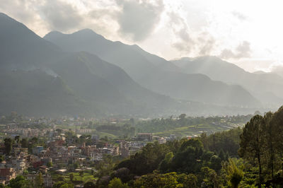 A haze over the mountains in the light of the setting sun in nepal,