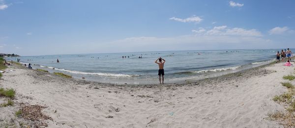 Scenic view of beach against sky