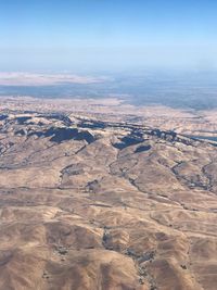 Aerial view of desert against sky