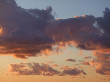 Low angle view of dramatic sky during sunset