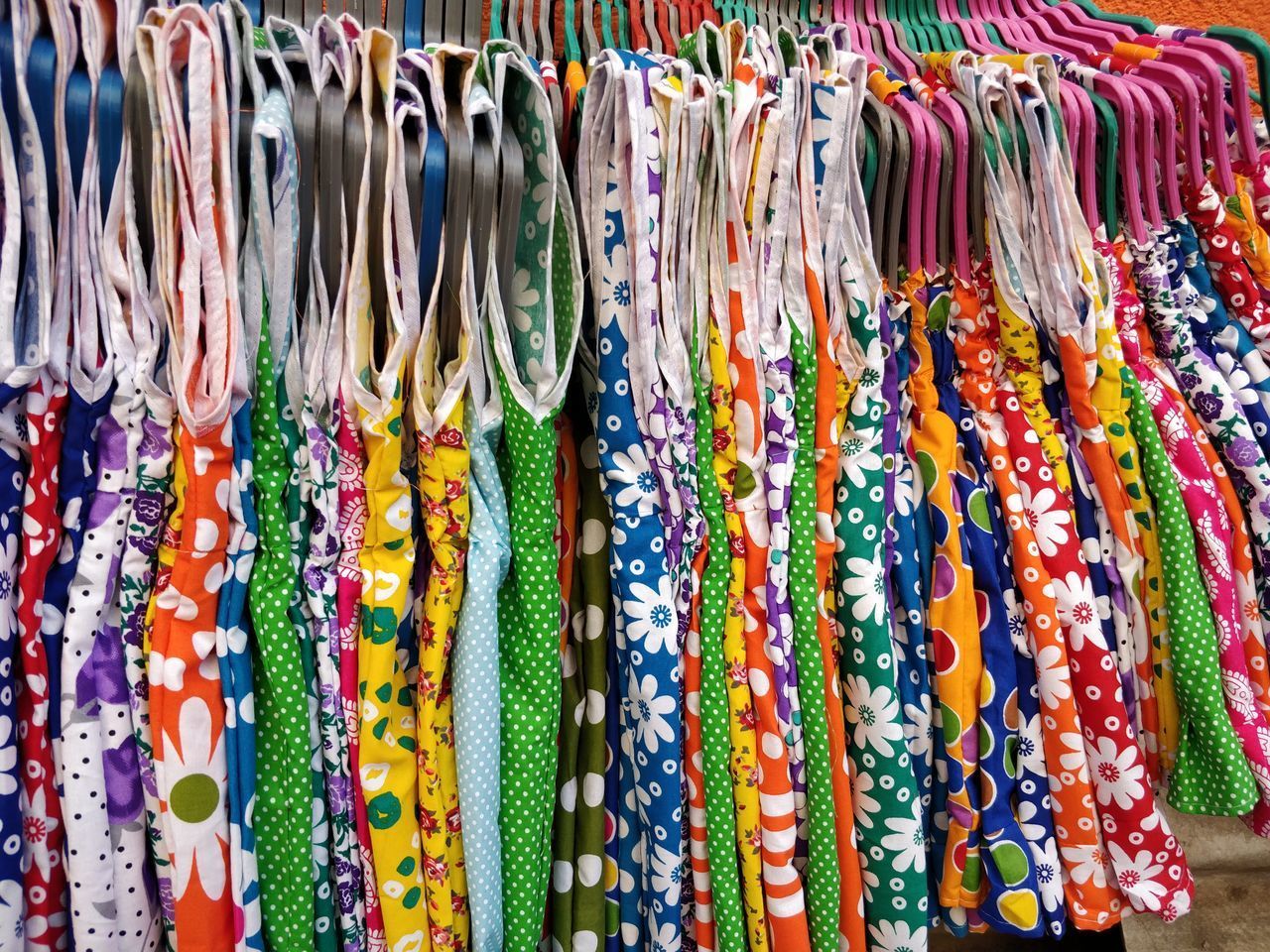 MULTI COLORED DECORATIONS HANGING IN MARKET