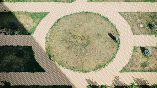 High angle view of people walking on footpath