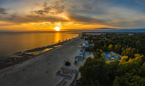 High angle view of sea against sky during sunset