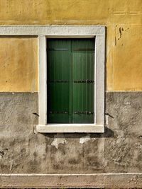 Full frame shot of building with closed window