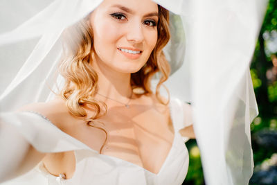 Portrait of smiling young woman