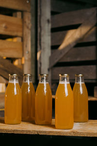 Close-up of glass bottles on table