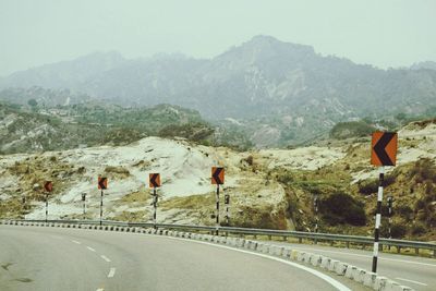 Road passing through mountains