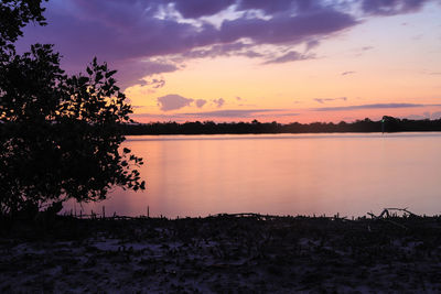 Scenic view of lake against sky during sunset