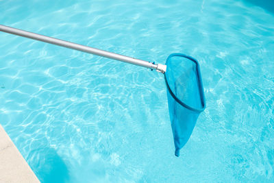 High angle view of floating on swimming pool