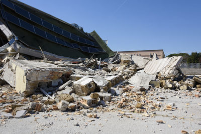 Low angle view of abandoned construction site against clear sky